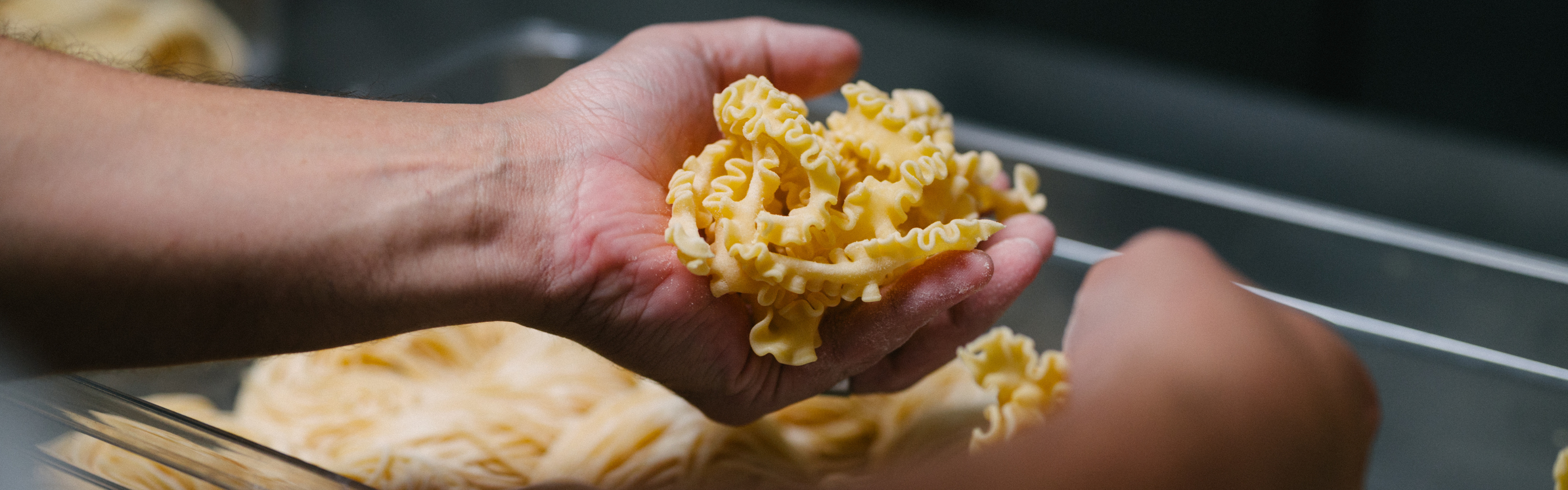 Fresh handmade pasta being prepared in the kitchen at Masseria Restaurant