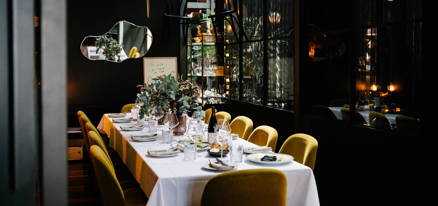 Private dining table set for a function at Cherubino City Cellar in Subiaco, Perth, featuring curated wines, shared plates, and an intimate wine bar setting