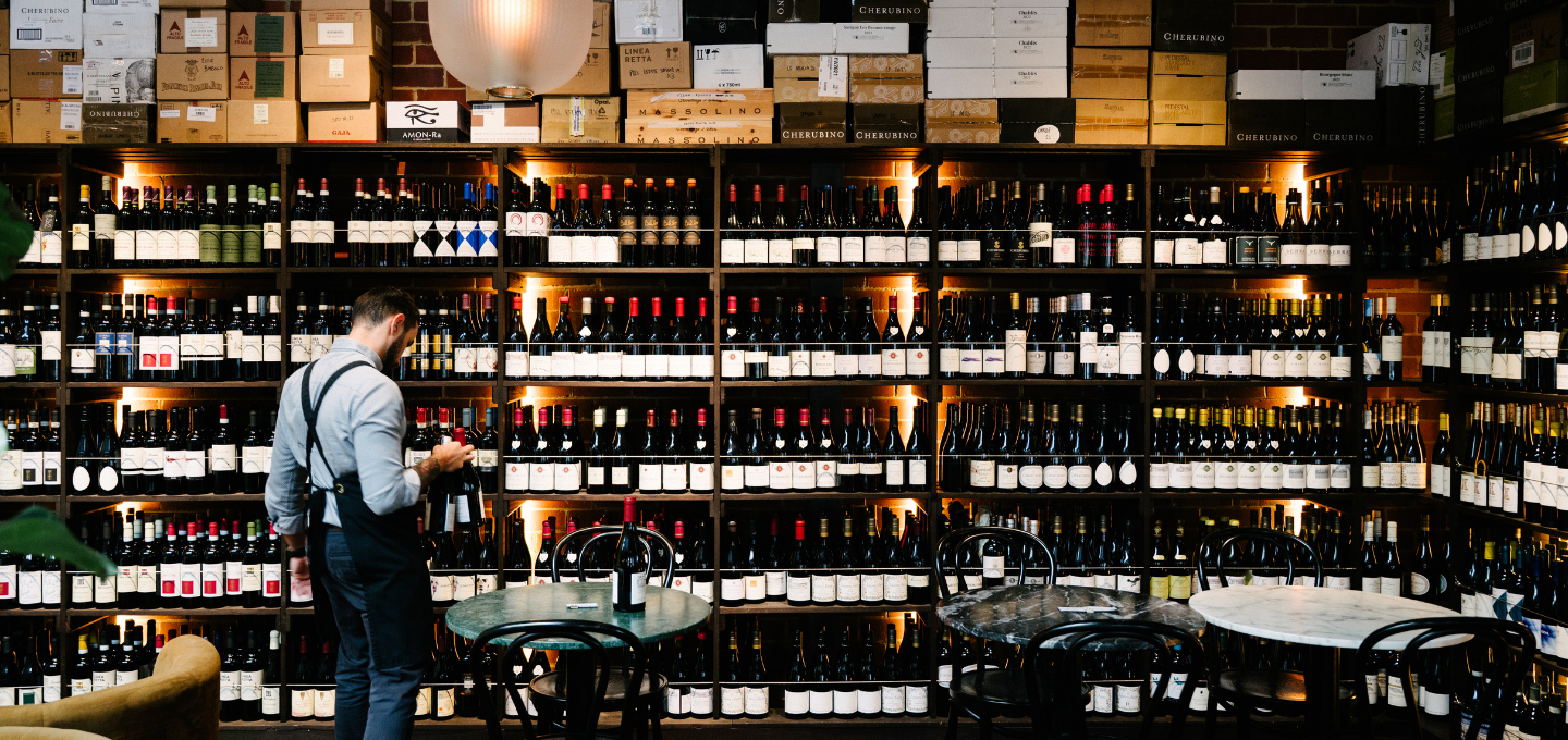 Wine wall and tasting tables inside Cherubino City Cellar wine bar in Subiaco, Perth