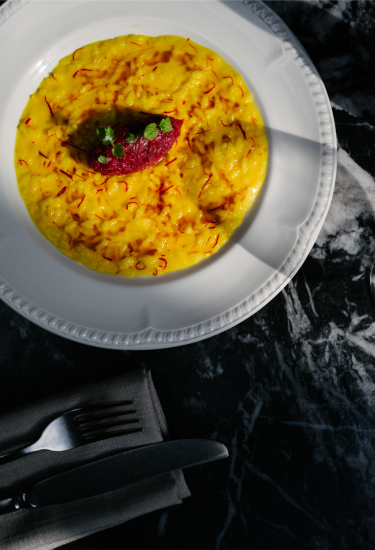 Saffron risotto served at Cherubino City Cellar wine bar in Subiaco, Perth